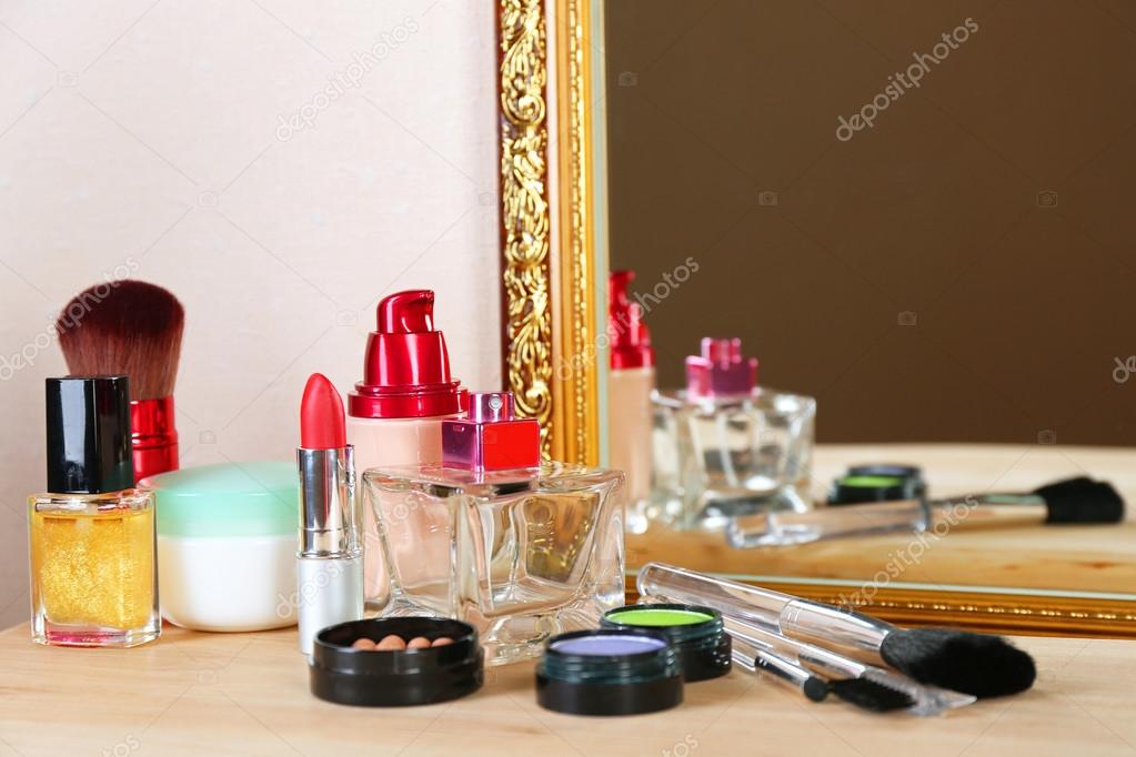 Different cosmetics on dressing table, close up