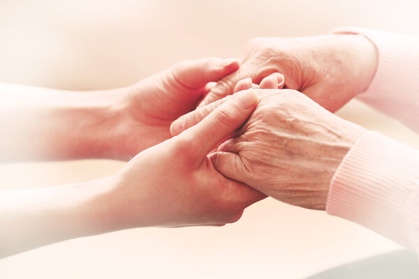 Helping hands, care for the elderly concept