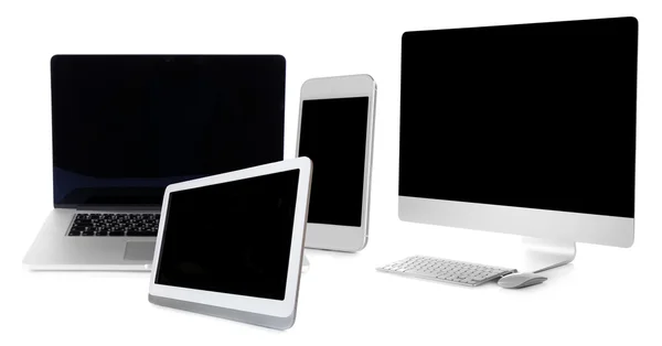 Computer, laptop, tablet and phone in collage isolated on white — Stock Photo, Image