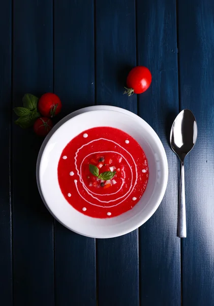 Gazpacho soup on color wooden background — Stock Photo, Image