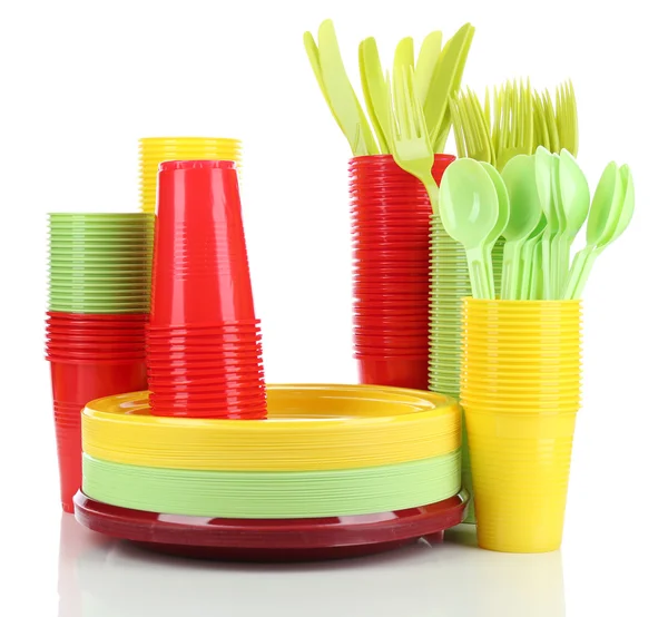 Bright plastic disposable tableware isolated on white — Stock Photo, Image