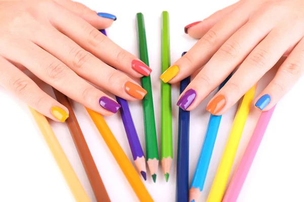 Multicolor female manicure with colored pencils isolated on white — Stock Photo, Image