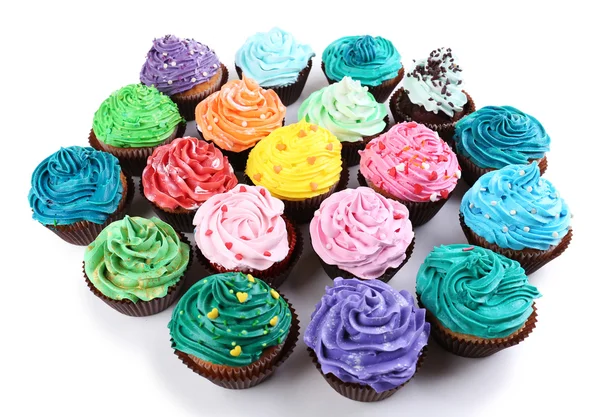 Deliciosos cupcakes isolados em branco — Fotografia de Stock