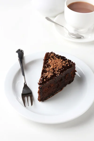 Yummy chocolate cake served on table — Stock Photo, Image