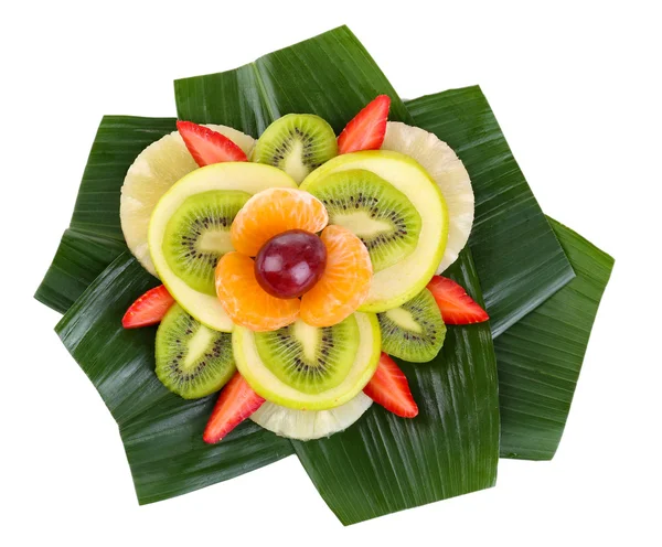 Fruit dessert op groene blad geïsoleerd op wit — Stockfoto