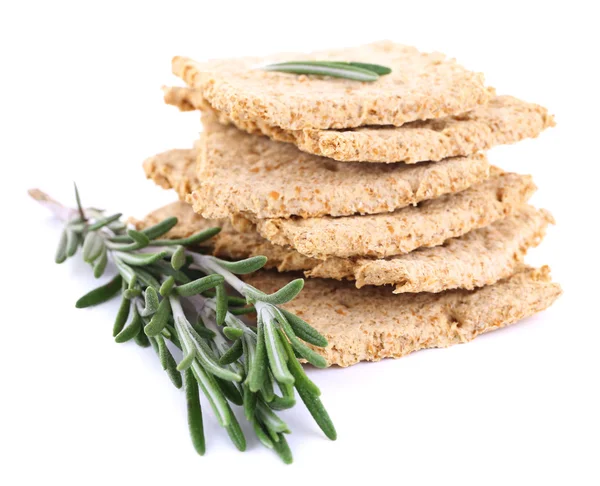 Crispbread with sprigs of rosemary isolated on white background — Stock Photo, Image