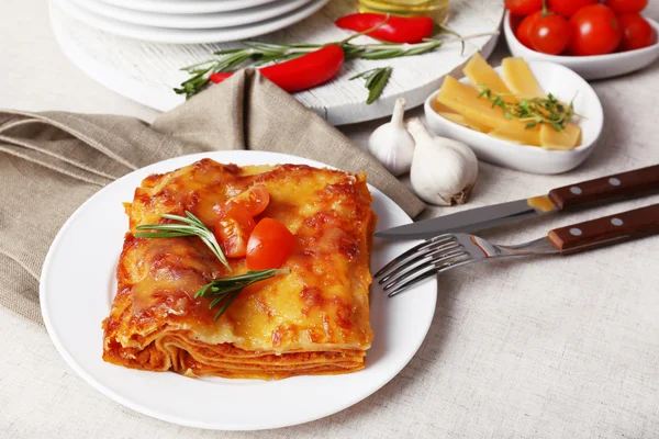 Portion of tasty lasagna on table — Stock Photo, Image