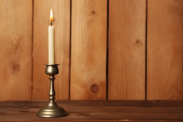 Retro candlestick with candle — Stock Photo, Image