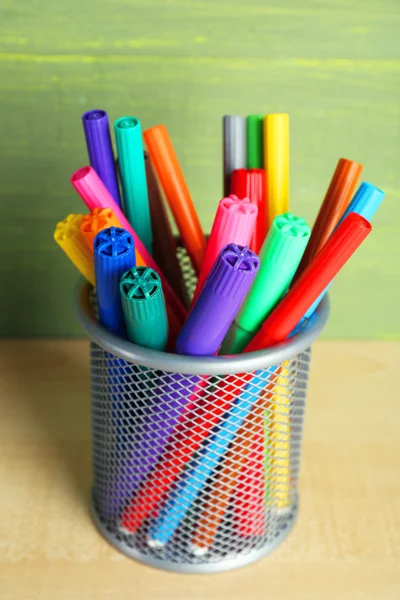 Colorful markers in metal holder — Stock Photo, Image