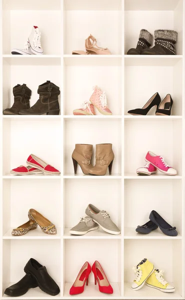 Shoes on shelves — Stock Photo, Image