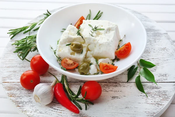 Feta cheese on wooden table — Stock Photo, Image