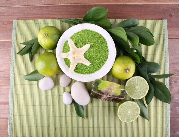 Spa still life on bamboo mat and wooden table background — Stock Photo, Image