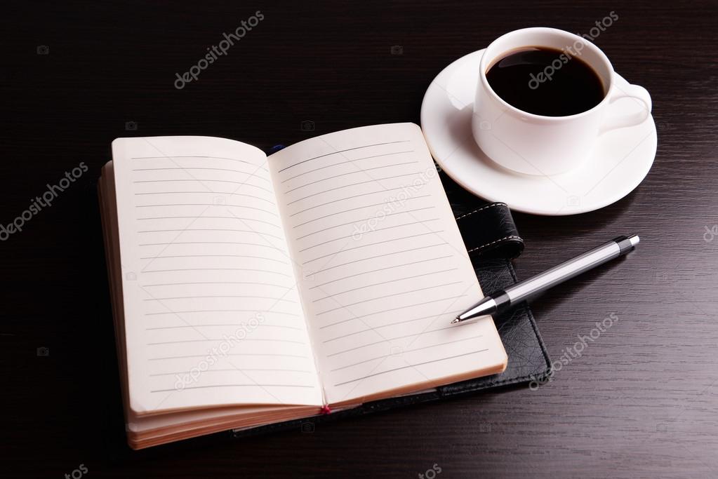 Coffee with diary and pen