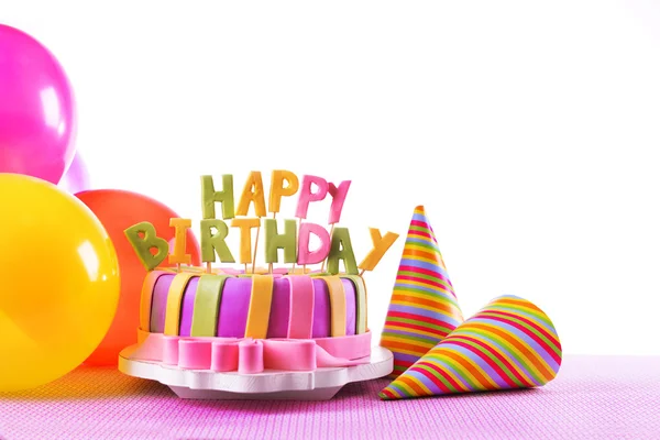 Delicious birthday cake on table on white background — Stock Photo, Image