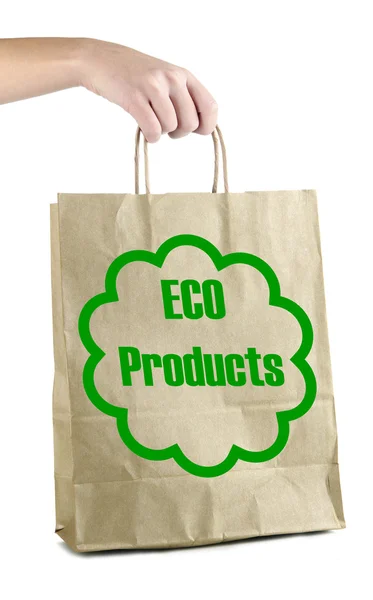 Papper väska med eco produkter i hand isolerad på vit — Stockfoto