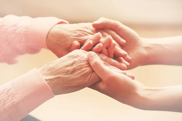 Helping hands, care for the elderly concept Royalty Free Stock Photos