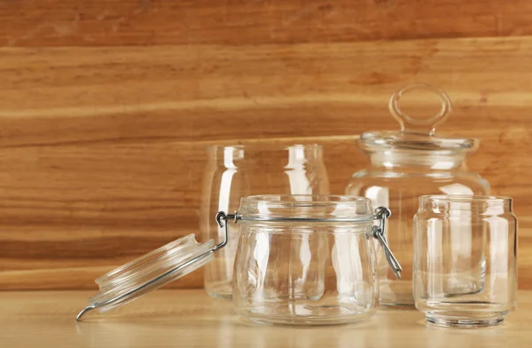 Set of empty glassware on wooden background — Stock Photo, Image