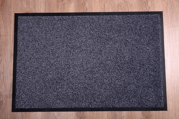 Серый ковер на полу крупным планом — стоковое фото