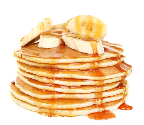 Stack of delicious pancakes with slices of banana and honey on plate isolated on white — Stock Photo, Image