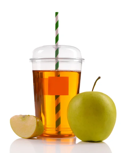 Juice in fast food closed cup with tube and apples isolated on white