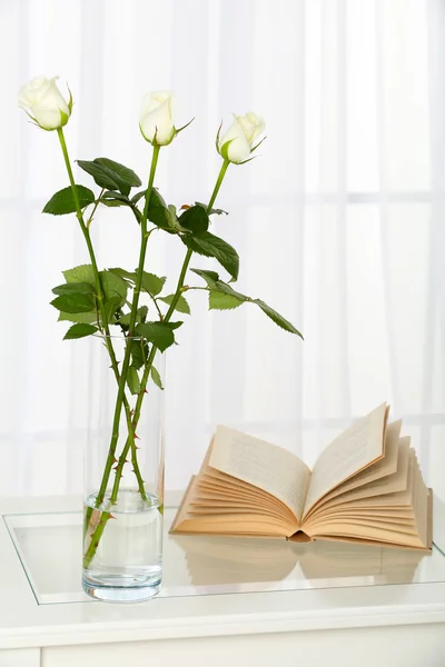 Beautiful bouquet of flowers in vase on window background — Stock Photo, Image