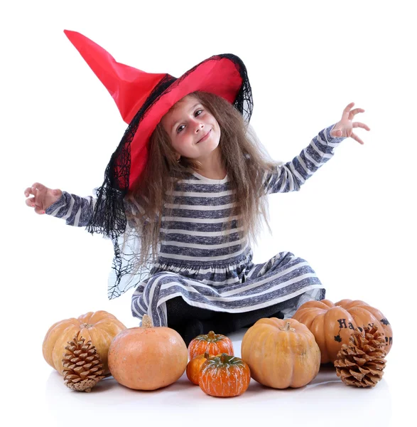 Niña bruja en sombrero con calabazas aisladas en blanco — Foto de Stock