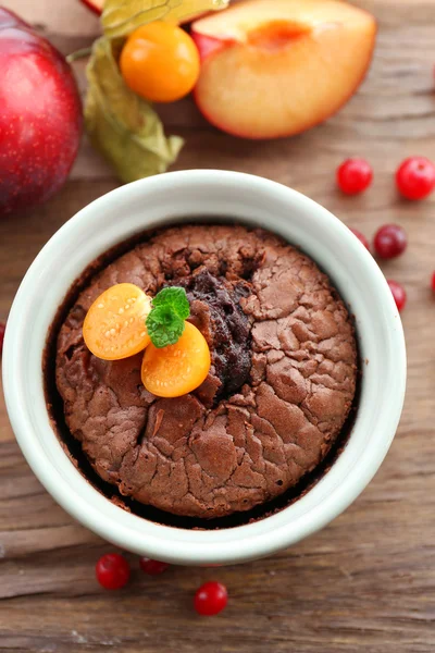 Hot chocolate pudding with fondant centre on table, close-up — Stock Photo, Image