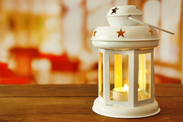 Lantern on wooden surface — Stock Photo, Image