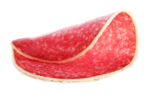 Rebanada de salami aislada sobre fondo blanco — Foto de Stock