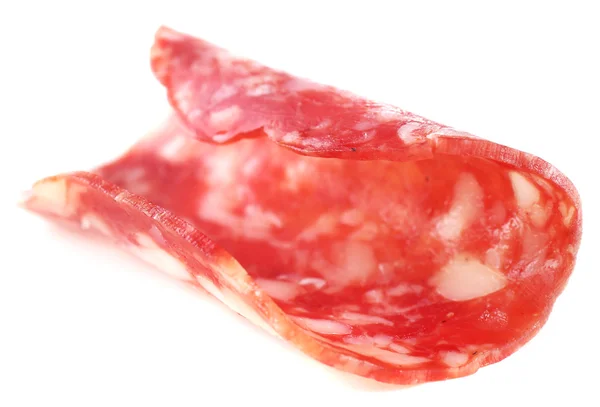 Tranche de salami isolée sur fond blanc — Photo