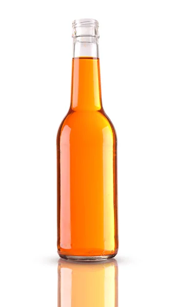 Colorful alcoholic beverage in glass bottle isolated on white — Stock Photo, Image