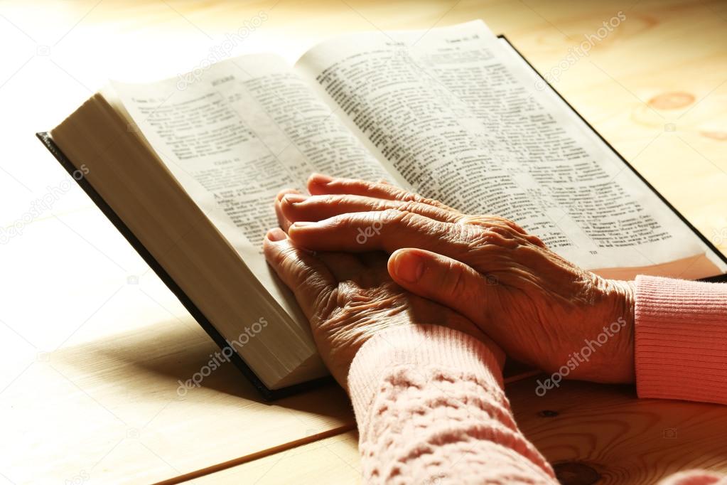 Old woman with Bible