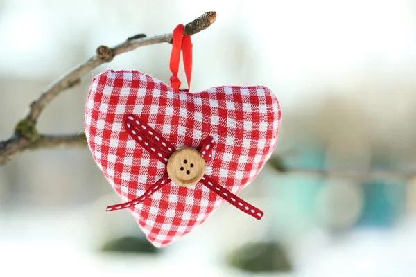Tree branch with heart decoration on nature background — Stock Photo, Image