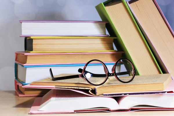 Composition with glasses and books — Stock Photo, Image