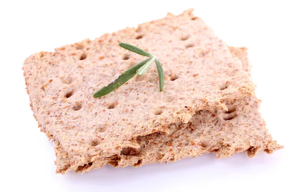 Pane croccante con rametti di rosmarino isolati su fondo bianco — Foto Stock