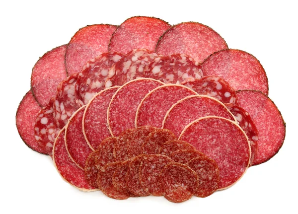 Scheiben Salami isoliert auf weiß — Stockfoto