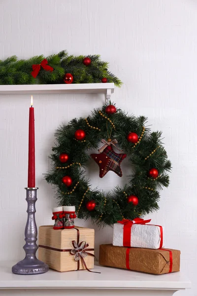 Christmas wreath on shelf — Stock Photo, Image