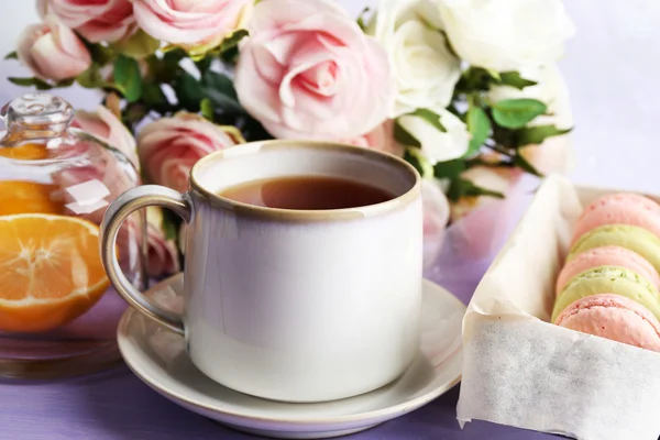 Colorful macaroons with tea — Stock Photo, Image