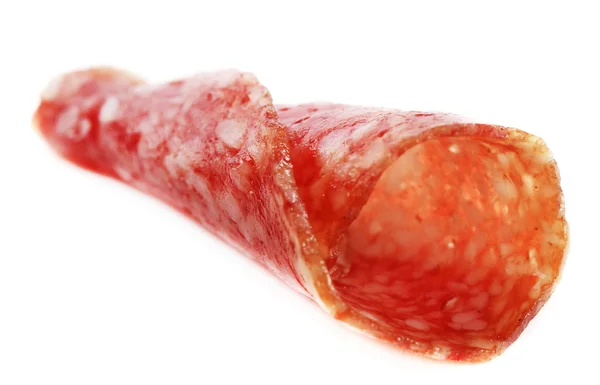 Rebanada de salami aislada sobre fondo blanco — Foto de Stock