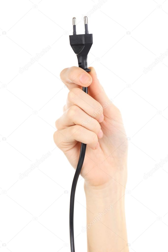 Hand holding electric plug
