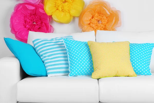 White sofa with colorful pillows — Stock Photo, Image