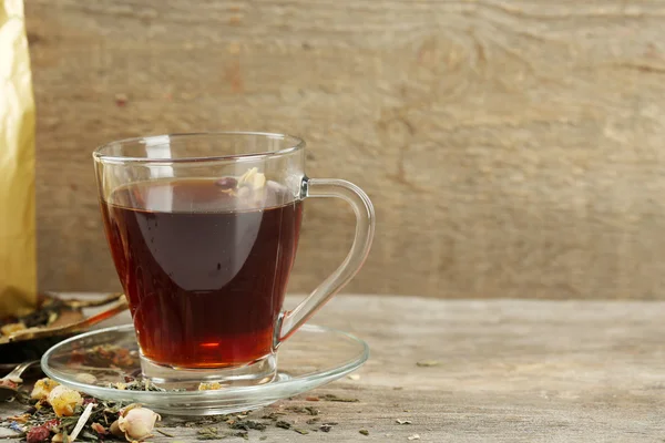 Piękny starodawny skład z herbaty ziołowe, na drewnianym stole — Zdjęcie stockowe