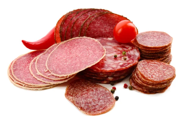 Various sliced salami with chili pepper, cherry tomatoes and spices isolated on white background — Stock Photo, Image