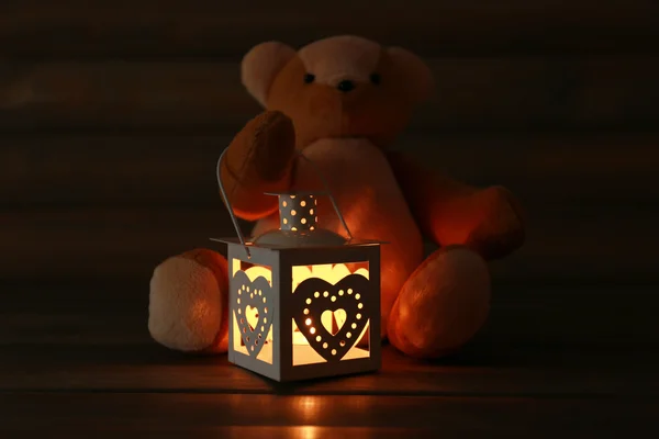 Teddy Bear with lantern on dark — Stock Photo, Image