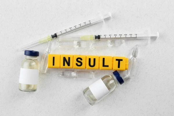 Parola d'insulto e attrezzature mediche — Foto Stock