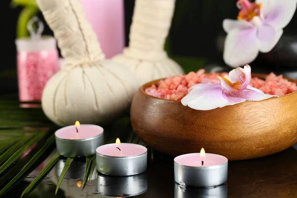 Beautiful spa composition with flowers on dark background — Stock Photo, Image