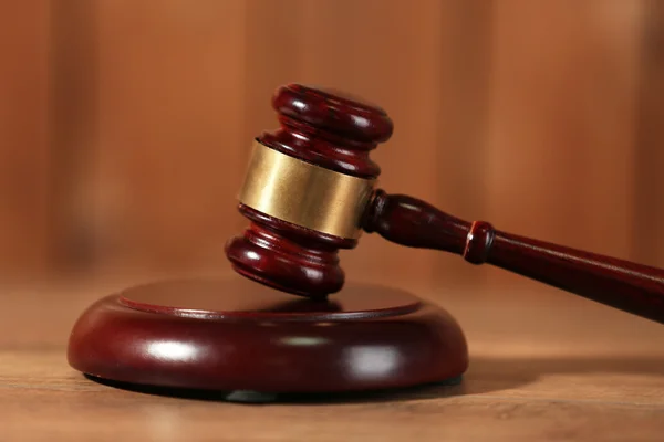 Wooden judges gavel on wooden table, close up — Stock Photo, Image