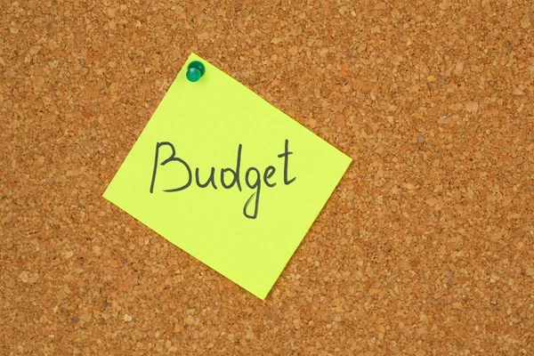 Paper sheet with inscription "Budget" on wooden background — Stock Photo, Image