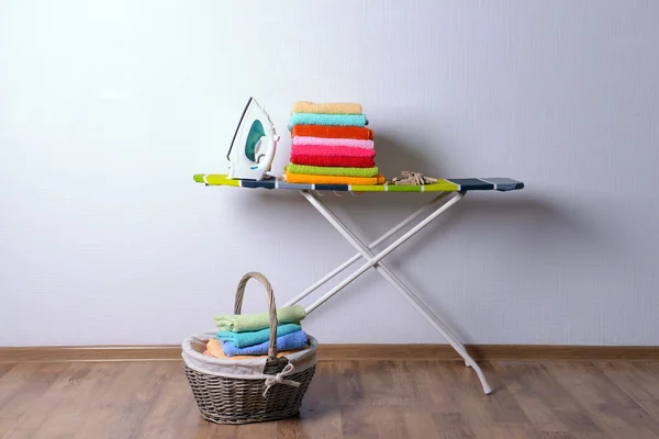 Ironing board with laundry — Stock Photo, Image