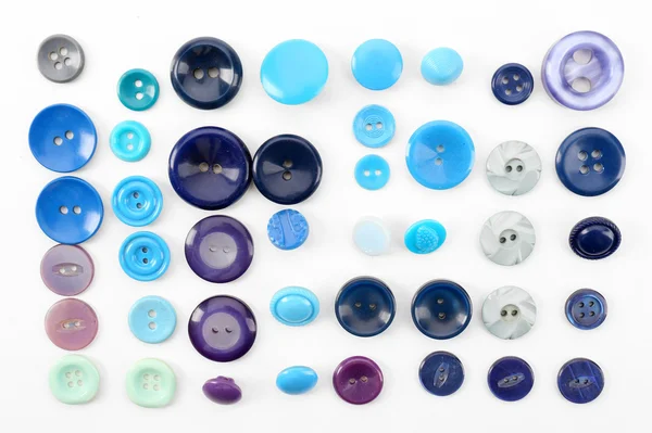 Kolorowe przyciski do szycia izolowane na biało — Zdjęcie stockowe